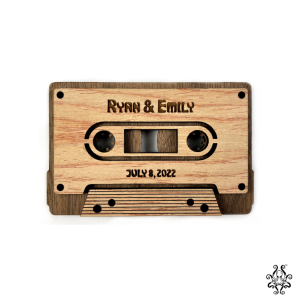 Front view of a laser-cut wooden cassette designed as a Mixtape With Personalised Spotify Playlist. The engraving features names and a date, capturing the nostalgic look of a classic cassette.