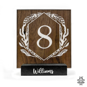 Boho-style wedding table number 8 with personalised walnut and acrylic design.